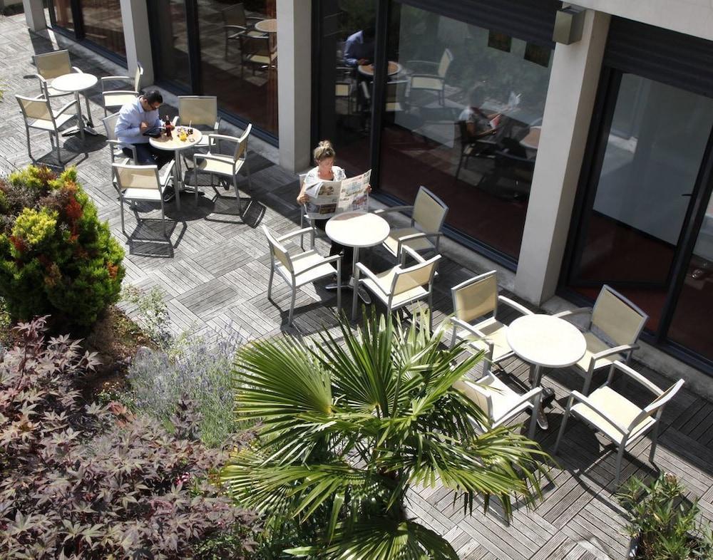 Brit Hotel Du Stade Rennes Ouest Bagian luar foto